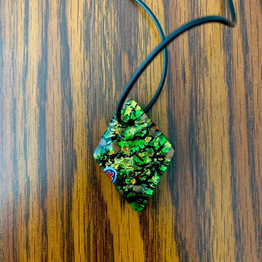 Murano glass pendant with faux leather necklace.